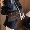 Bolso de lunares a la moda, modelo nuevo y simple, bolso de hombro único de nicho de moda para el día a día, versión coreana 2026, bolso de axila para mujer con diseño elegante