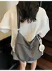 Bolso de mezclilla transfronterizo para mujer Gran capacidad 2025 Nuevo verano Versátil Nicho Un solo hombro Bandolera Bolso dumpling para ir al trabajo