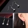 Qiao Lanxuan Europa y los Estados Unidos populares exquisitas joyas retro borla colgante arena luz cuentas pendientes al por mayor comercio exterior adornos de plata femenina