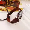 Atacado de joias de Yiwu pulseira unissex pulseira de cruz de couro genuíno estilo europeu e americano pulseira de couro de vaca
