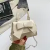 Bolsa de alta qualidade, estilosa e de nicho com laço para mulheres, nova moda, bolsa transversal versátil, bolsa quadrada pequena de cor lisa para sair