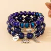 Pulsera de Brazalete con Colgante de Palma Cruzada Estilo Bohemio Elástica Multicapa con Cuentas