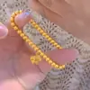 Tienda de oro con cuentas de transferencia de color esmalte de arena dorada antigua doble feliz cobre chapado en oro moda gato Joker ojo de gato pulsera al por mayor