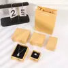 En stock caja de tapa superior e inferior negra al por mayor caja de papel kraft para joyería caja de embalaje para joyería de pulsera anillo pendiente collar