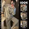 Novos pijamas femininos primavera e outono manga comprida outono internet-famoso exterior vestindo outono e inverno roupas de casa conjunto de duas peças para terno cabelo