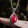 El fabricante de plata para personajes suministra directamente joyería de plata S925 joyería de plata tailandesa para mujer colgante de gota de granada