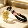 Venta Caliente Año del Cordero Tener Dinero para Gastar Llavero Dorado Oro Puro 999 Correa para Teléfono Colgante de Bolso Empaque de Caja de Regalo Regalo para Conducir