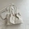 Bolsa feminina de grande capacidade para uso transfronteiriço, nova coleção outono 2026, bolsa de ombro versátil e elegante, bolsa tote moderna e casual para o trabalho e uso diário