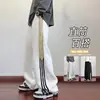 Pantalones deportivos de rayas personalizados/estilo americano, nueva colección de otoño, corte holgado, caída suave, bordado color-blocking, versátiles pantalones deportivos casuales, largos, blanco y gris