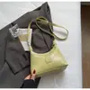 Bolsa Pequena Moderna Retro de Luxo para Mulheres Verão e Inverno Nova Moda 2026 Bolsa Transversal de Ombro Único Sob o Braço Bolsa Bolinho