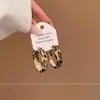 Pendientes de Aro con Estampado de Leopardo Europeos y Americanos para Mujer, Pendientes Sencillos de Moda con Personalidad Retro Artística, Joyería para Orejas Versátil Elegante Exagerada de Gama Alta