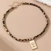 Nz3477 Collar de Cuerda de Terciopelo con Estampado de Leopardo Europeo y Americano Transfronterizo Colgante de Pez Sol Colgante Único Diseño de Moda Joyería para Mujer