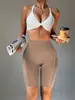 Pantalones cortos de fitness sin costuras de cinco puntos de estilo nuevo para verano, shorts deportivos de yoga ajustados de cintura alta para realzar los glúteos para mujer