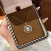 Nuevo producto transfronterizo: Collar colorido de titanio con ojo turco de circón para mujer, incrustado con diamantes, cadena redonda para la clavícula con ojo azul