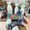 Comercio exterior fábrica personalizada mayoreo cerámica estilo japonés jarra para calentar vino cálida jarra para vino transparente medio jin dos liang licor sake separador de vino