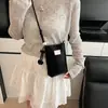 Moda Coreana Casual Bolso Pequeño Mujer 2025 Otoño e Invierno Nuevo Bolso Cuadrado Pequeño Casual Bolso Mensajero Mini para Teléfono Móvil Venta al por Mayor