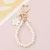 Llavero Cadena Perla Sakura Colgante Corazón Girly Dulce Hecho a Mano DIY Encanto para Bolso Llavero
