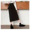 Falda negra estilo Hepburn francés de línea A, cintura alta, adelgazante, con caída y abertura lateral, falda de longitud media, Otoño/Invierno 2025