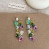 Pendientes de borla de cristal de lirio de color dopamina para mujer, pendientes de temperamento fresco y dulce, de moda que combinan con todo.