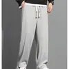 Calças Casuais Soltas de Primavera e Outono Marca de Moda Tendência Cor Sólida Calças Esportivas Masculinas Jovens Populares Calças Longas Estilo Simples