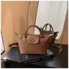 Elegante bolso de mano con patrón tejido, nuevo diseño retro para mujer, bolso tipo cubo único, bolso de hombro moderno, bolso cruzado de moda