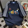 Camiseta de Manga Corta con Estampado de Dibujos Animados Divertidos y Diseño Color-Blocking 2026 Verano Nuevo Versátil de Estilo Vintage