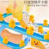 Celebridad de Internet Explosivo Patito Eléctrico Infantil que Sube Escaleras Tren de Riel Juguete Educativo Actualizado con Múltiples Canciones Venta al por Mayor