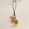 Colgante para teléfono móvil de caqui al por mayor, colgante de caqui Ruyi, colgante de vidrio para bolso, colgante de placa USB, ruyi de jade anti-pérdida