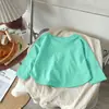Camiseta de Manga Larga para Niños Primavera/Verano 2026 Estilo Coreano Corte Holgado Color Caramelo Camiseta Base Top Liso para Niños y Niñas