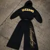 Sudadera americana de calle transfronteriza de corte holgado con estampado de letras de espuma, versátil y elegante, pantalones casuales unisex de pierna ancha