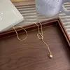 Corrente de suéter de inverno ajustável com borla de bola geométrica, design simples e de nicho, colar de corrente longa para suéter vazado