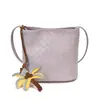 Exquisito Bolso Pequeño Súper Popular y Elegante para Mujer 2026 Nueva Moda Popular Bolso Cubo Tejido Versátil para el Trabajo Bolso Cruzado