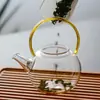 Fabricante Personalizado Olla de Vidrio de Borosilicato Resistente al Calor Mini Olla con Viga Elevadora Resistente a Altas Temperaturas Set de Té Verde para el Hogar
