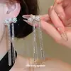 Pendientes de plata con baño de oro real de 18 quilates, aguja de plata, borla de lazo de circonita, pendientes de lujo ligero de alta gama, accesorios de oreja exquisitos y a la moda