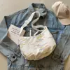 Bolsa Casual Versátil para Mulheres 2025 Nova Bolsa Dumpling Simples de Alta Qualidade Popular Bolsa de Ombro Leve Bolsa Transversal