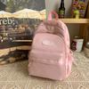Mochila para Mulheres 2026 Verão Novo Estilo Doce e Clara Mochila de Grande Capacidade para Alunos do Ensino Fundamental e Médio Mochila Escolar de Grande Capacidade
