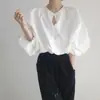 Corea del Sur verano nuevo elegante cuello redondo un botón diseño hueco suelto manga de farol protección solar camisa top