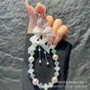 Colgante Llavero de Encaje con Lazo de Gama Alta, Cadena de Perla Cristalina de Diosa para Teléfono Móvil, Estilo Corto, Cadena Colgante, Venta al por Mayor