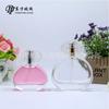 Molde de fábrica botella de perfume de 30 ml redonda plana de alta gama botella de vidrio bayoneta spray prensa sub-botella de perfume