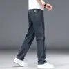 Jeans azules para hombre, pantalones largos casuales de verano finos rectos holgados, marca de moda para hombre, elásticos transpirables de hielo-oxígeno