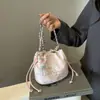 Bolso Pequeño de Verano para Mujer 2025 Nueva Moda Nuevo Estilo Chino Casual Bolso Cubo Nicho Simple Personalizado Bolso Cruzado
