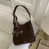 Bolso de Mano Mujer 2026 Japón Otoño Invierno Versátil Moda Tote Colgante Coreano Viaje Cruzado Perro Pequeño Estilo Nuevo Bolso de Hombro Simple