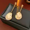 Pendientes asimétricos de plata con baño de oro real de 18 quilates, aretes de moda europeos y americanos versátiles y sencillos, pendientes de lujo ligero de alta gama