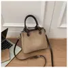 Bolsa tote de luxo leve, retrô, color block, pequena bolsa de mão para mulheres, nova coleção 2026, moda de nicho, bolsa de ombro versátil, bolsa transversal da moda