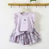 Conjunto de Verano para Niñas 2026 Nuevo Estilo Camiseta de Manga Acampanada para Niños Pantalones de Falda Floral Conjunto de Dos Piezas