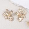 Transfronterizo Europa y Estados Unidos moda simple textura de pliegues irregulares aretes de flores creativos únicos mujeres viajeras diarias
