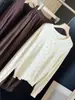 Cárdigan de punto de moda estilo coreano para mujer, que reduce la edad, con estampado de estrellas, cuello redondo, nueva colección de otoño, corte holgado, adelgazante, manga larga, prenda exterior