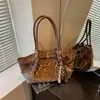 Bolsa de ombro de grande capacidade para trajeto diário transfronteiriço para mulheres, nova coleção outono/inverno 2026, bolsa tote retrô, bolsa de antebraço