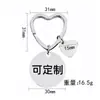 Llavero con forma de corazón transfronterizo europeo y americano, ideal como regalo conmemorativo del Día de la Madre o de Acción de Gracias, con grabado de metal.