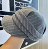 2025 Nueva Gorra de Béisbol de Lana a Rayas Otoño e Invierno Moda Versátil Cálida Cortavientos Estilo Retro Británico Gorra de Artista